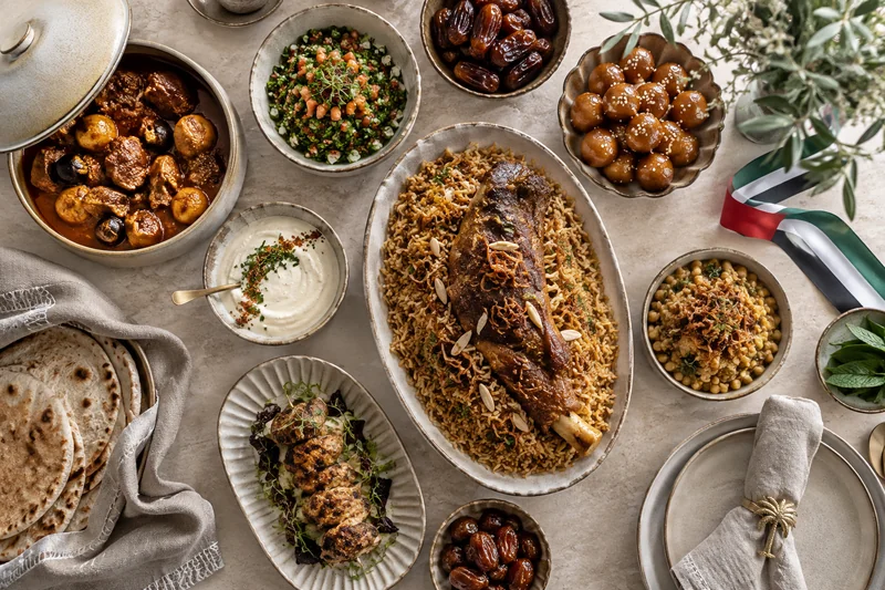 An Emirati-style feast with rice, lamb, dates and sweet dumplings