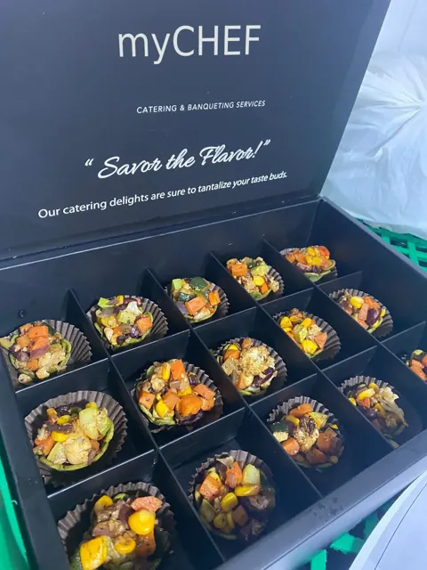Vegetarian canapé selection in a myCHEF presentation box.