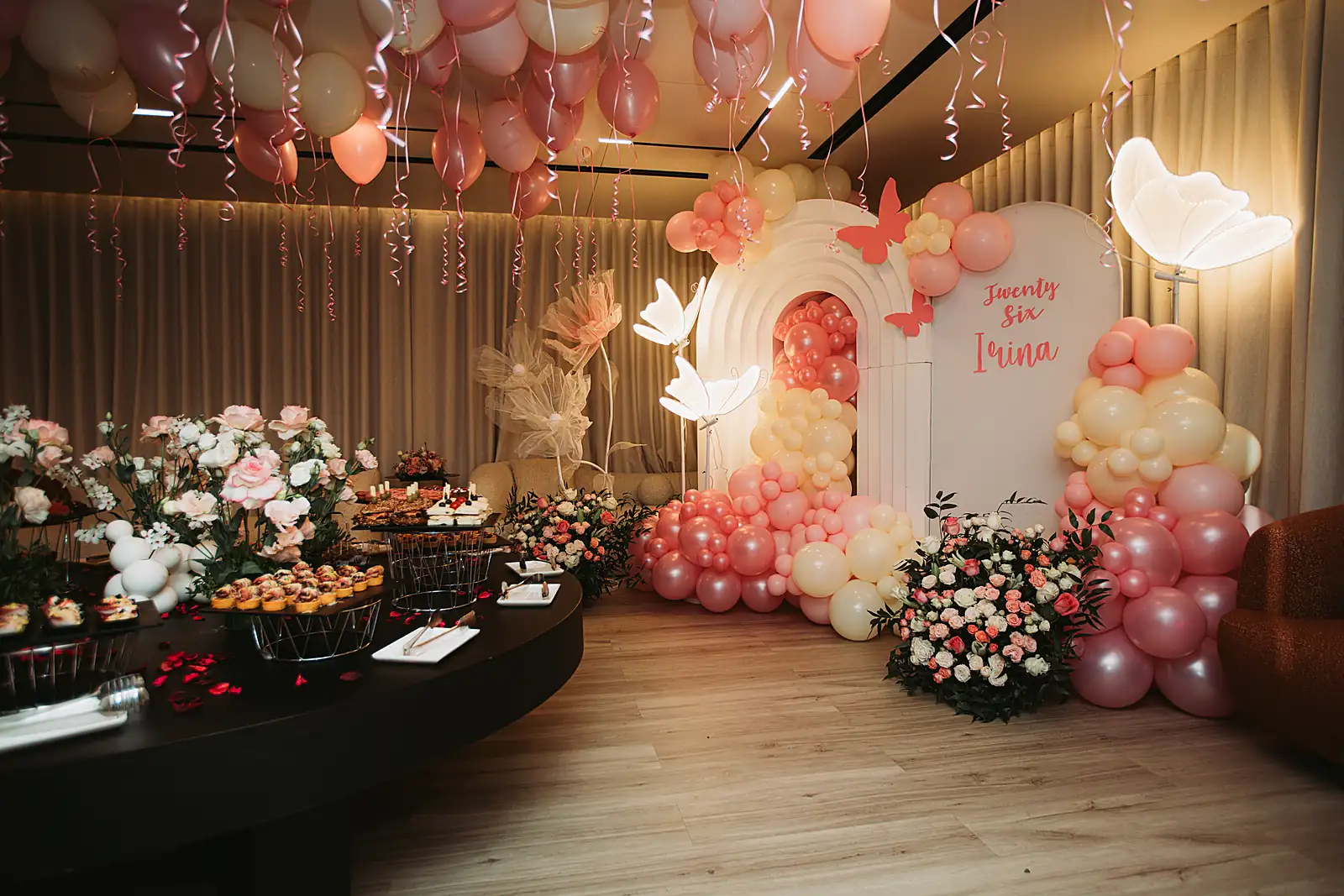 Yacht salon styled for a birthday with a food table and florals, from a previous myCHEF catering day.