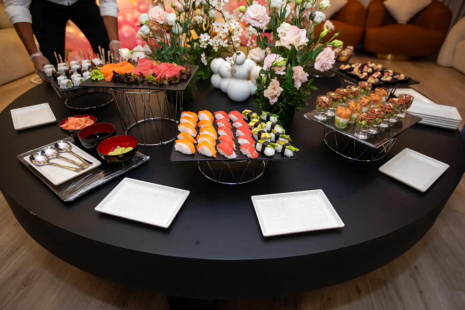 Sushi grazing table being set in a yacht salon on a previous myCHEF catering day.