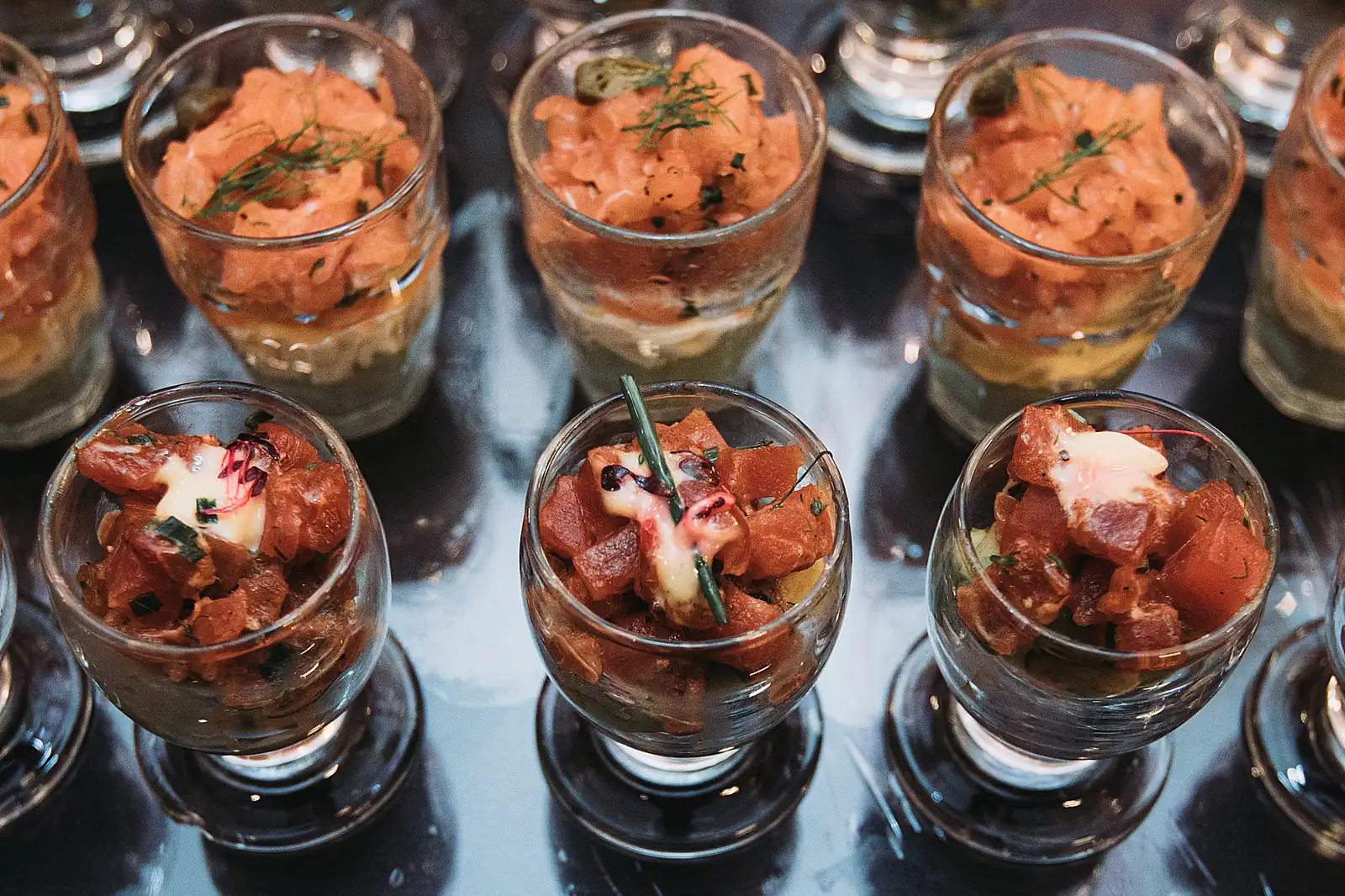 Tuna and salmon tartare served in glasses for yacht canapé service, from a previous myCHEF catering day.